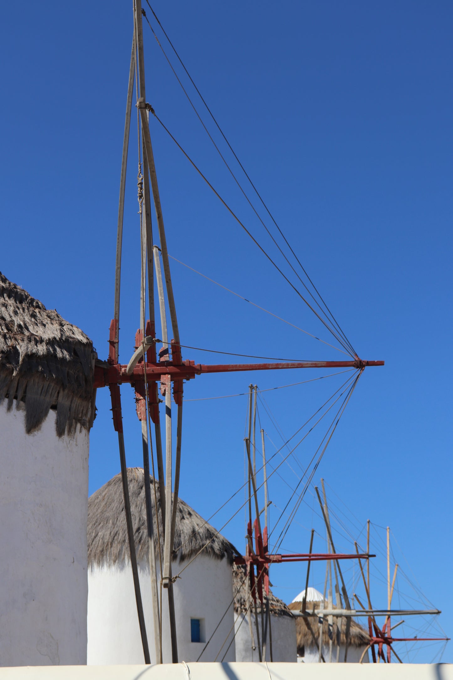 Whispers of the Aegean – Windmills of Mykonos