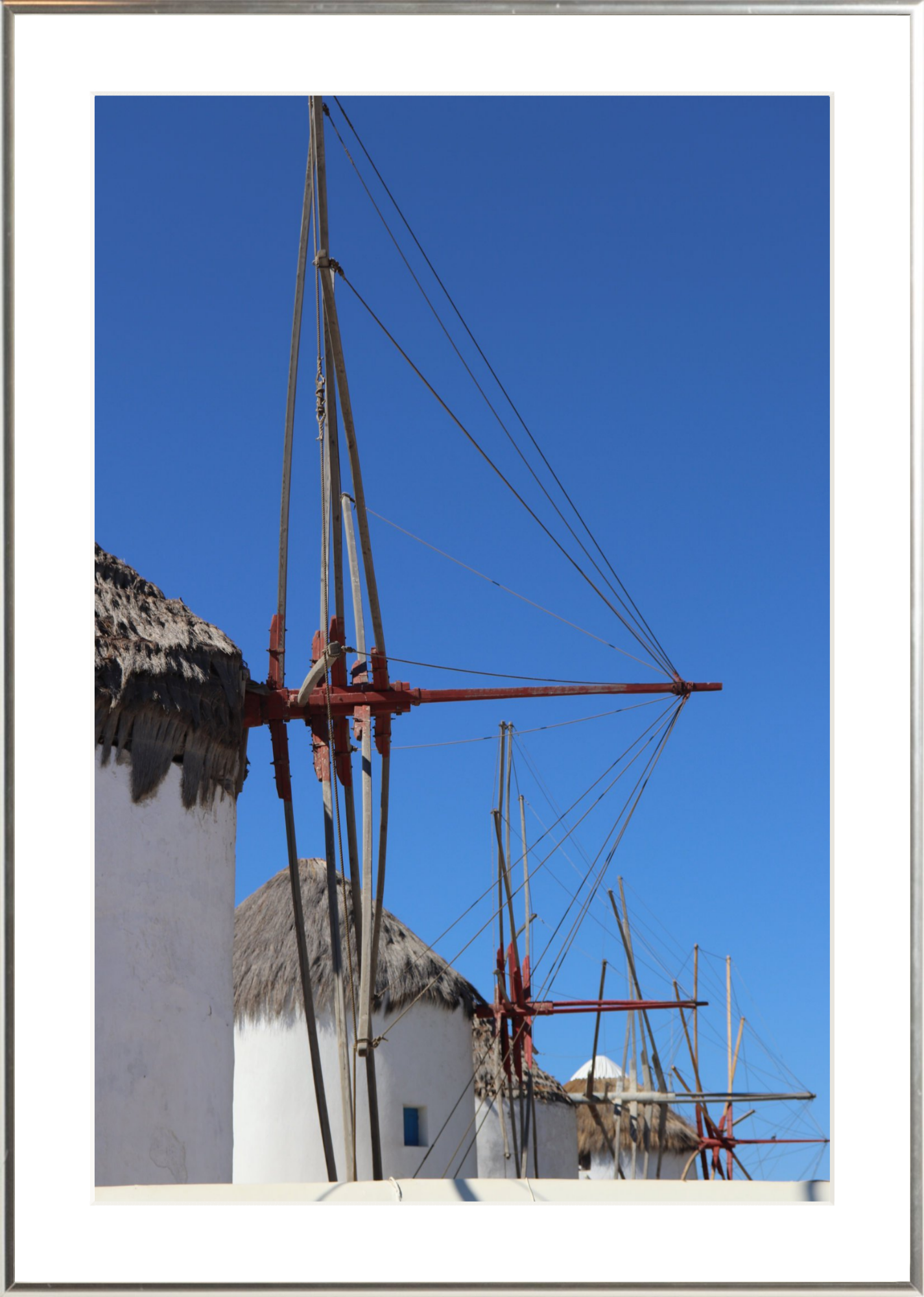 Whispers of the Aegean – Windmills of Mykonos